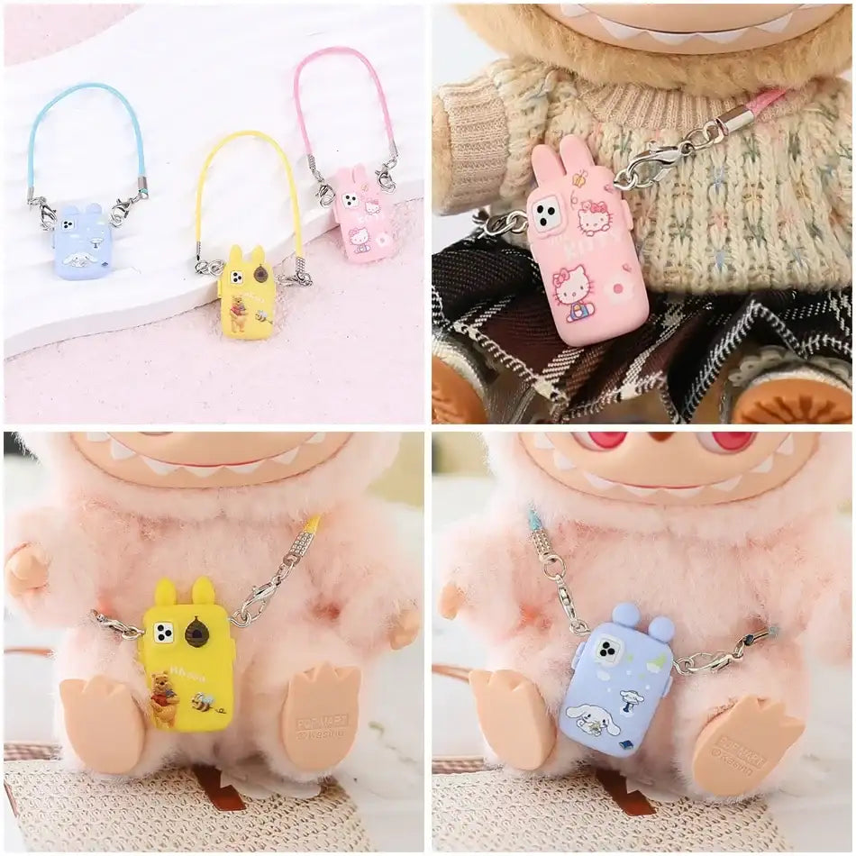 alt="Mini téléphone décoratif avec lanière colorée pour figurine Labubu – accessoire moderne, plastique robuste, dimensions miniatures, style fun et unique"