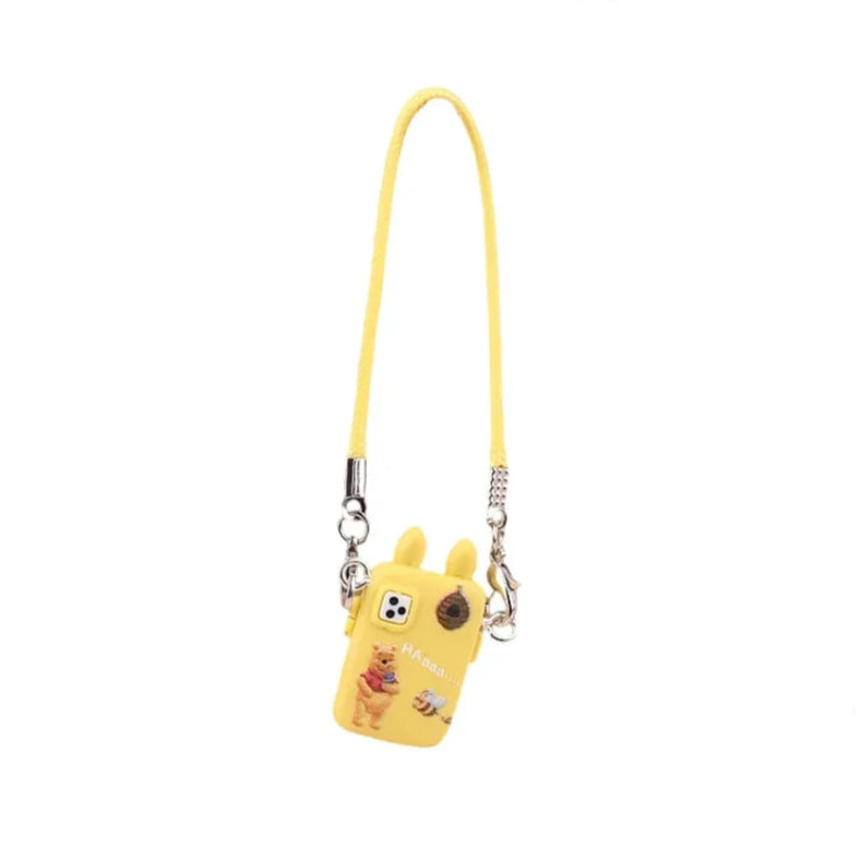 alt="Mini téléphone décoratif avec lanière colorée pour figurine Labubu – accessoire moderne, plastique robuste, dimensions miniatures, style fun et unique"
