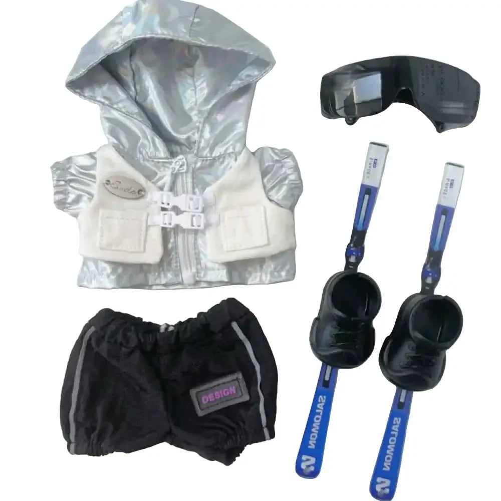 Tenue Complète Ski pour Labubu comprenant une veste irisée, lunettes de ski, skis et chaussures.