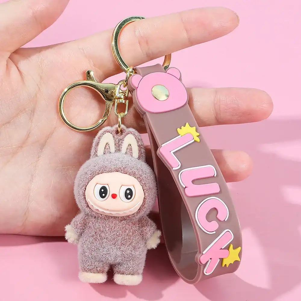 Porte-clés Labubu Premium « LUCK » en silicone, avec mascotte kawaii, idéal pour sécuriser clés et sacs.
