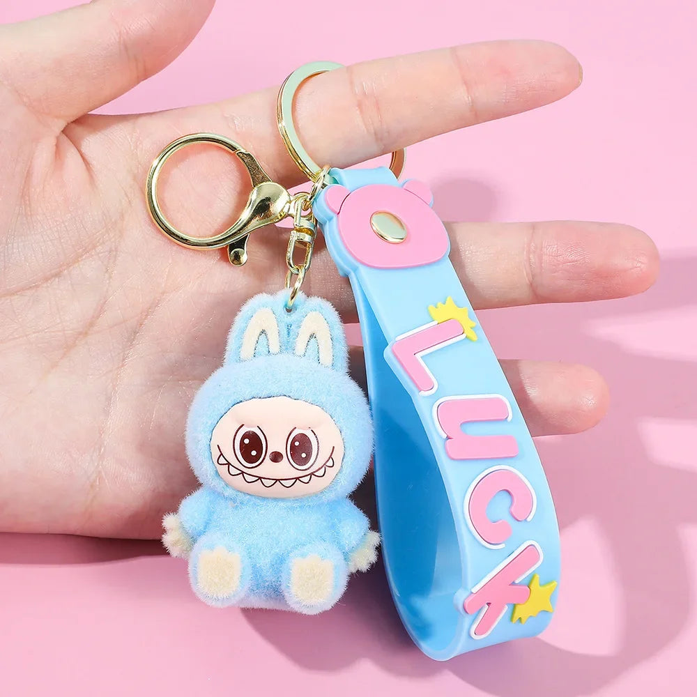 Porte-clés Labubu Premium « LUCK » en silicone bleu avec mascotte et anneau, accessoire kawaii tendance.