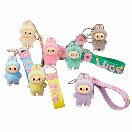 Porte-clés Labubu Premium « LUCK » en silicone avec mascottes kawaii colorées et anneaux pratiques pour clés.