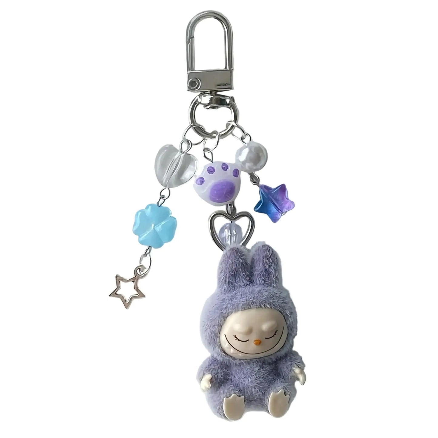 Porte-clés Labubu en peluche violet avec étoiles et accessoires colorés, ajoutant douceur et charme au quotidien.
