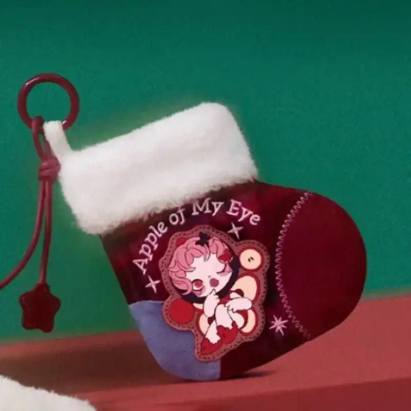 Chaussette Labubu Apple Of My Eye avec personnage mignon sur fond vert, collection festive.