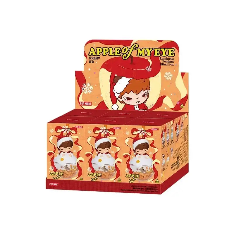 Labubu boules de Noël "Apple Of My Eye" présentées dans un emballage coloré et festif.