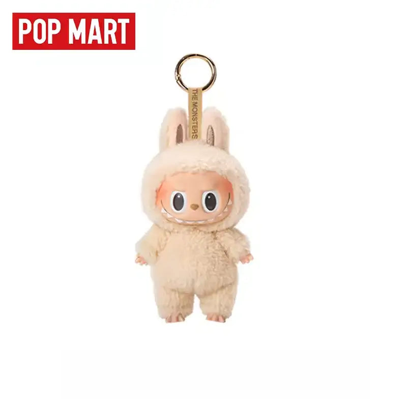 Labubu adorable porte-clés en peluche, collection Pop Mart avec un personnage mignon en costume de lapin.