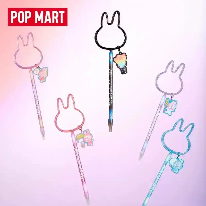 Stylos colorés Labubu de la série Big into Energy avec des motifs de lapin et des pendentifs mignons.