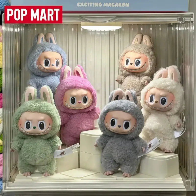 Labubu figurines de la collection Exciting Macaron de Pop Mart, montrant des peluches colorées avec des oreilles de lapin.